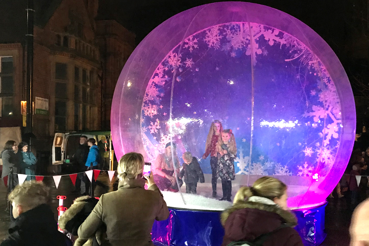 Giant Snow Globe The Joker Entertainment providing circus entertainment, circus skills, stilt walking, balloon modelling, participation activity's and face painting in the Midlands, Nottinghamshire, Yorkshire, Leicestershire, Lincolnshire, Chesterfield, Wingerworth, Matlock, Derbyshire, Darley Dale, Clowne, Alfreton, Ripley, Wirksworth, Sutton in Ashfield, Kirkby in Ashfield, Nottinghamshire, Leicestershire, Staffordshire, Lincolnshire, South Yorkshire